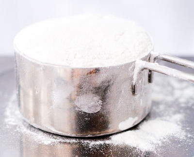 measuring-a-cup-of-flour